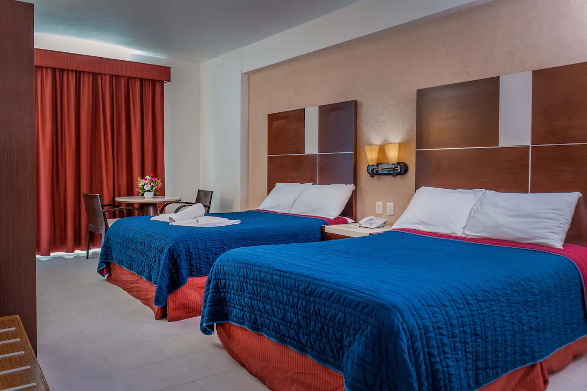 Guest room interior at Hotel Baluartes